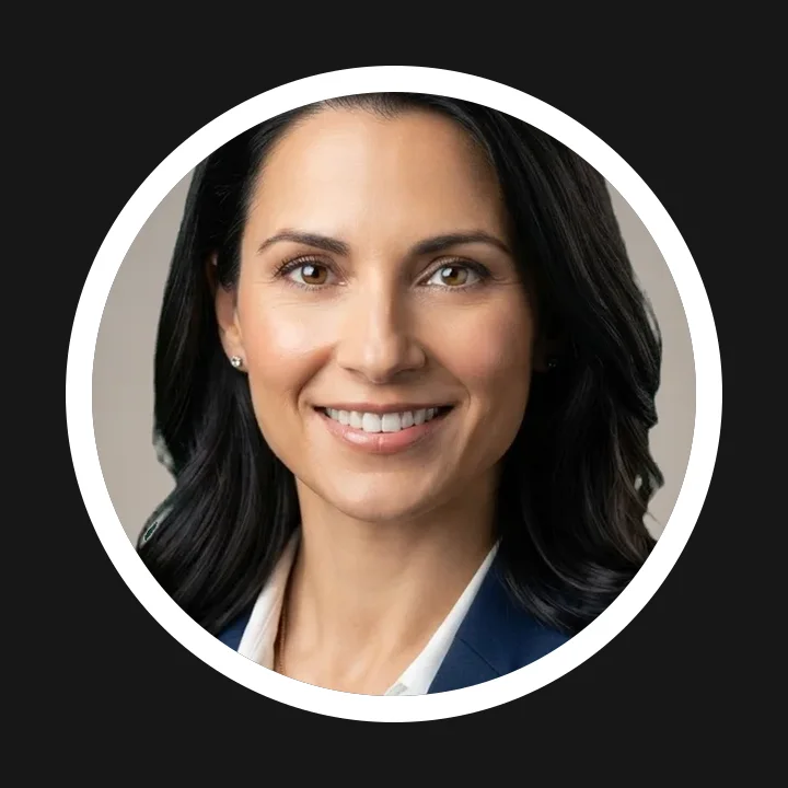 Round profile picture with a white ring on a dark background
